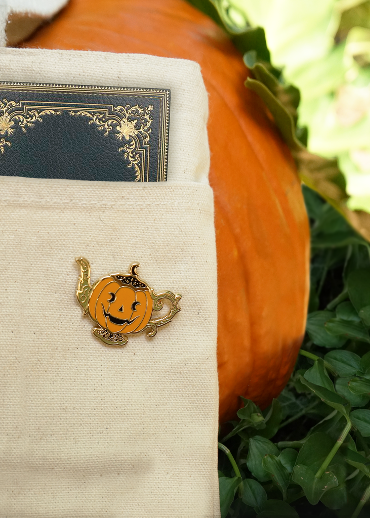 jack-o-lanturn pumpkin pin on canvas book bag in pumpkin patch