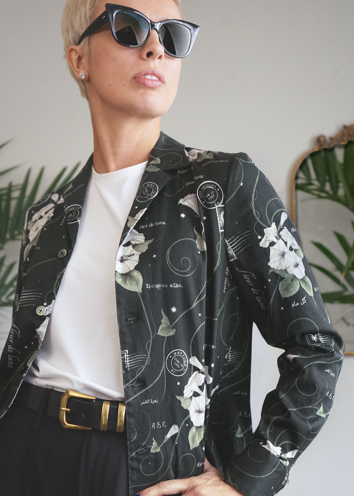 Close up of Amy wearing Atlas shirt jacket in midnight magic print