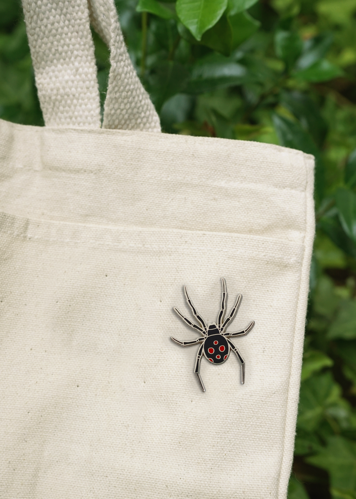 Black widow pin on canvas tote bag