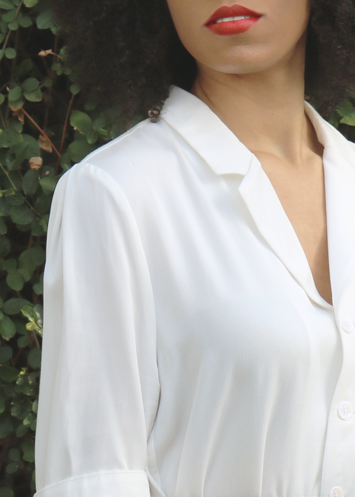 Close up of Mikayla wearing Atlas shirt