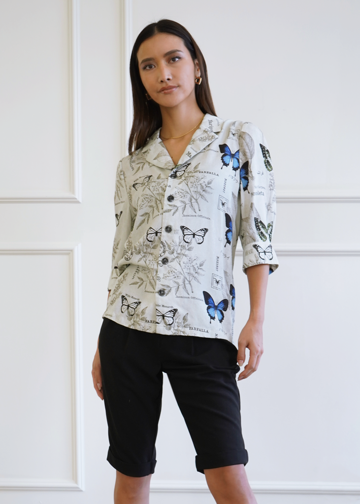 Front of model wearing 3/4 sleeve atlas shirt in botany print