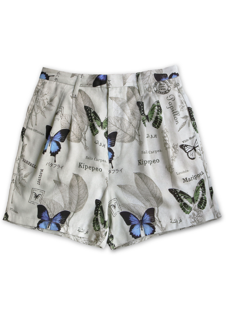 Front of double pleated lounge shorts with butterfly print
