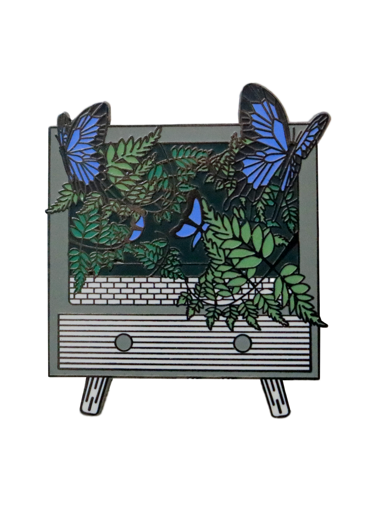 Enamel blue morpho Butterfly pin with butterflies and leaves flying out of a TV